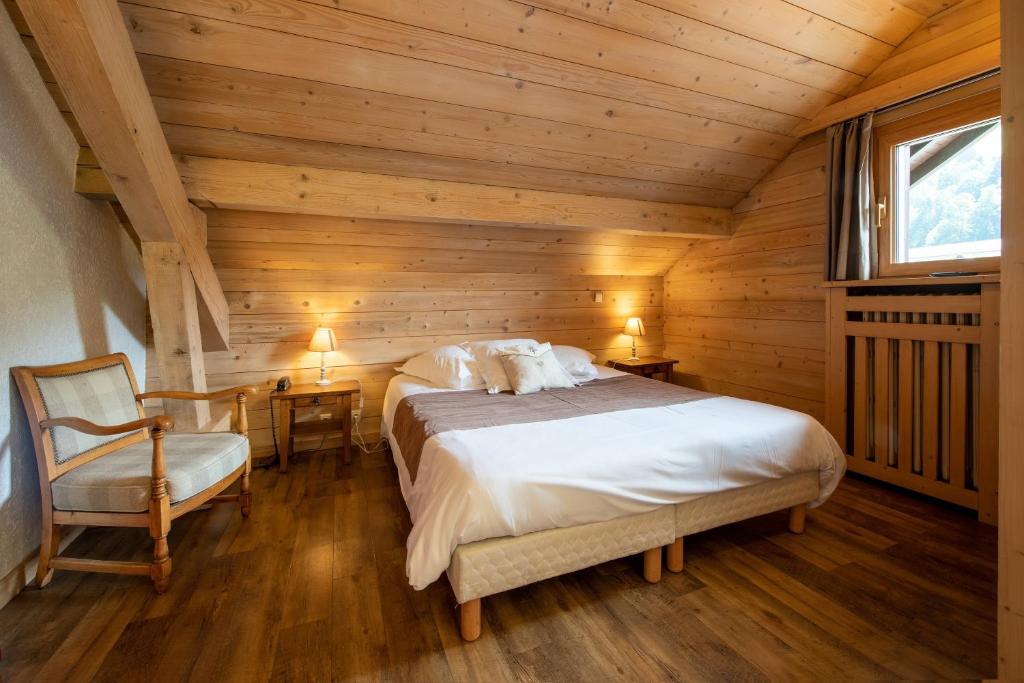 Postel nebo postele na pokoji v ubytování Hôtel La Montagne