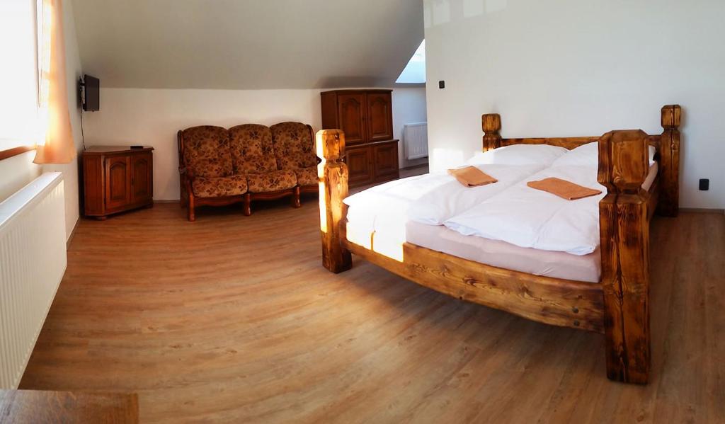 Postel nebo postele na pokoji v ubytování Apartmány Šachty