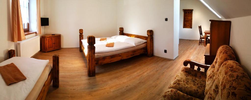 Postel nebo postele na pokoji v ubytování Apartmány Šachty