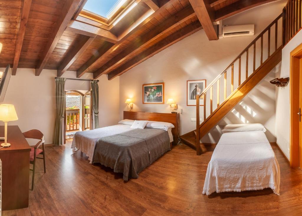Posteľ alebo postele v izbe v ubytovaní Hotel Fonda Merce