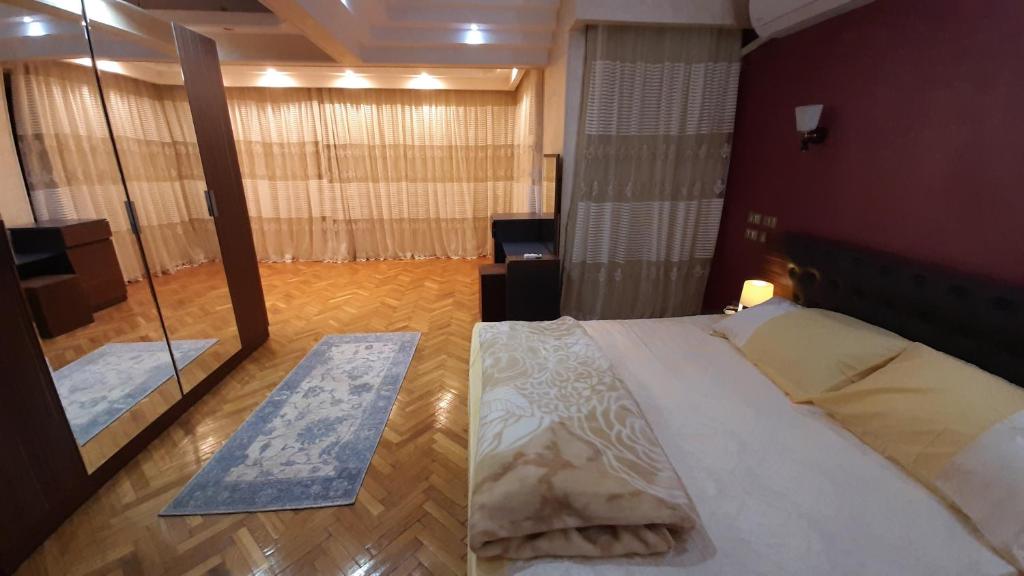 Postel nebo postele na pokoji v ubytování Villa Nasr city