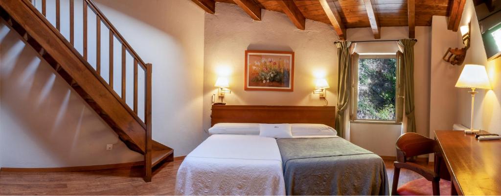 Posteľ alebo postele v izbe v ubytovaní Hotel Fonda Merce