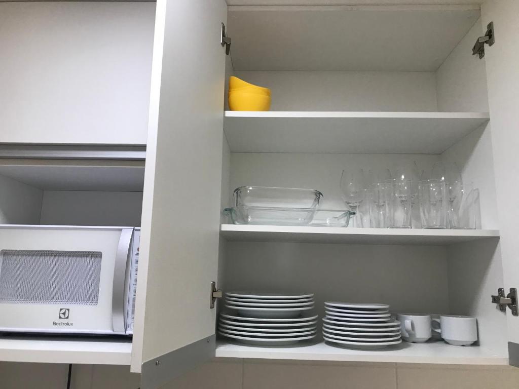 Kuchyň nebo kuchyňský kout v ubytování Apartamento Completo Jatiúca