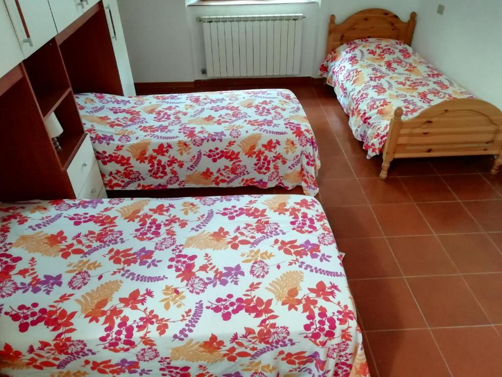 Postel nebo postele na pokoji v ubytování Podere Poggio Corbo