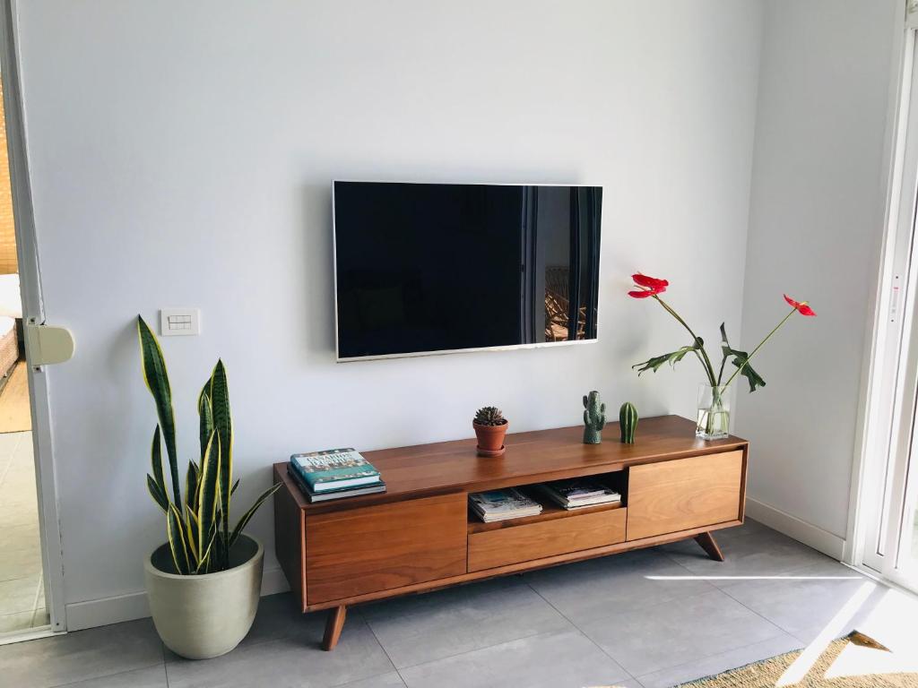 TV a/nebo společenská místnost v ubytování La Casa Verde