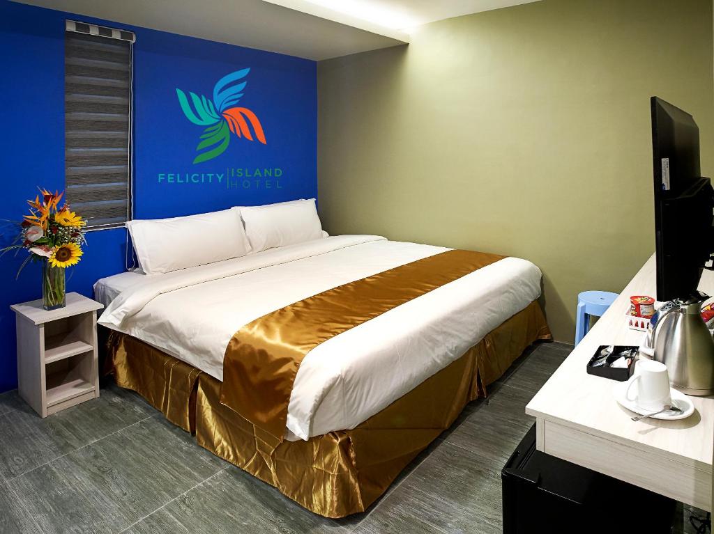Katil atau katil-katil dalam bilik di Felicity Island Hotel