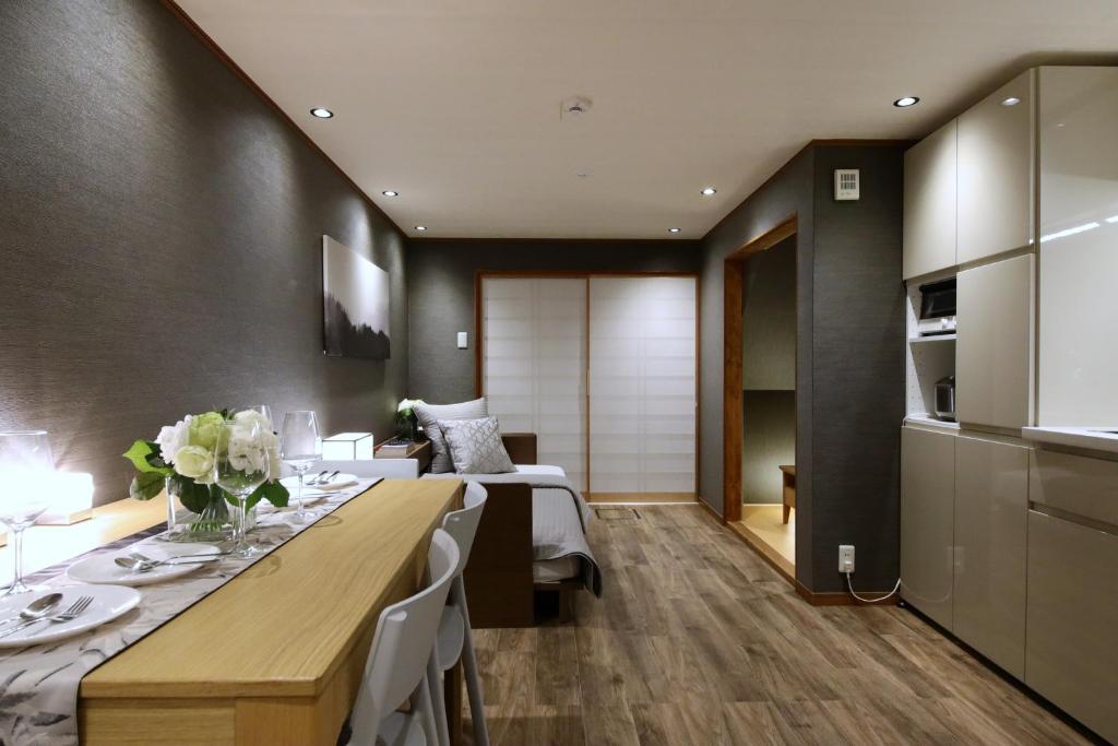 Kuchyň nebo kuchyňský kout v ubytování Shiki Homes IKKO 8
