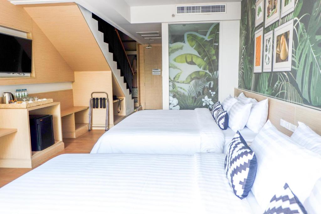 Postel nebo postele na pokoji v ubytování Panan Krabi Resort