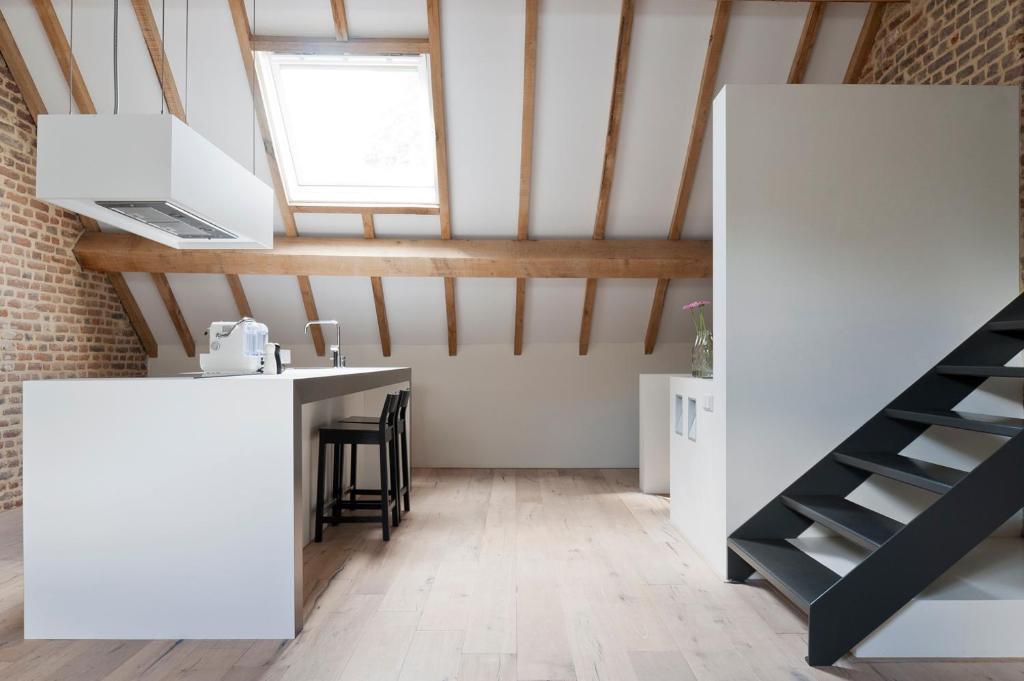 Kuchyň nebo kuchyňský kout v ubytování Cour 8 Lofts