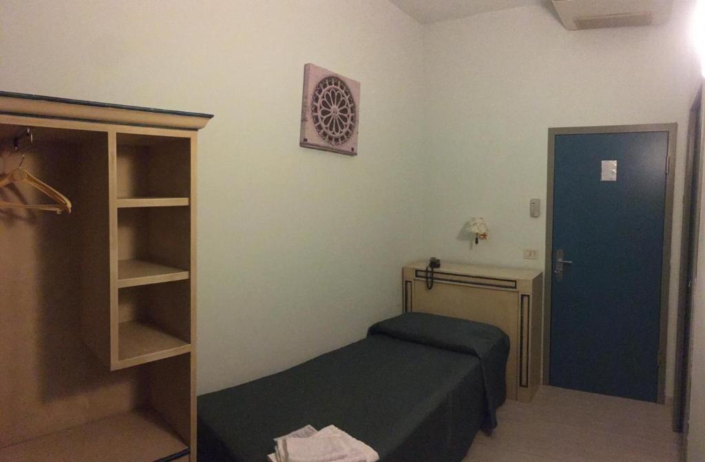 Cama ou camas em um quarto em Hotel Il Castello