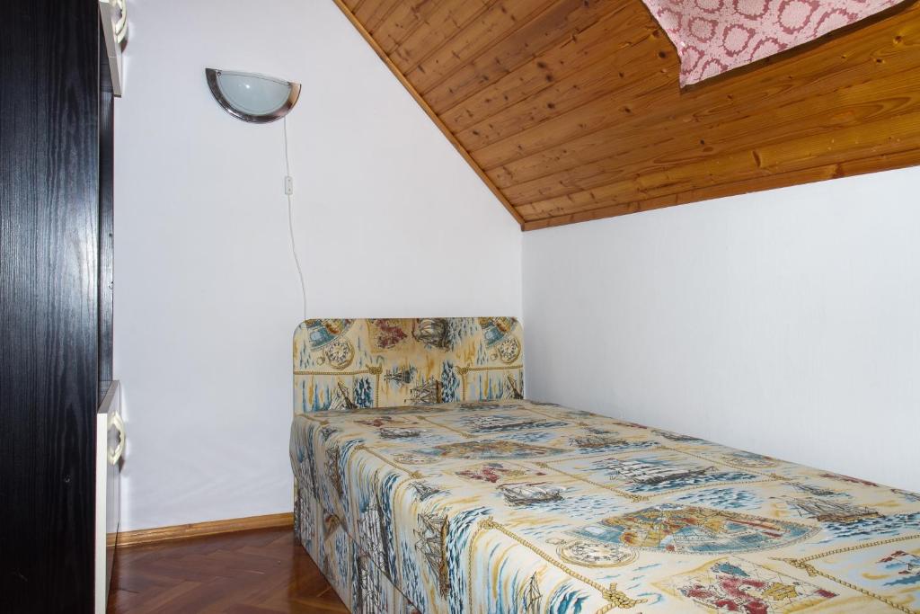 Posteľ alebo postele v izbe v ubytovaní Familia Nyaraló 87
