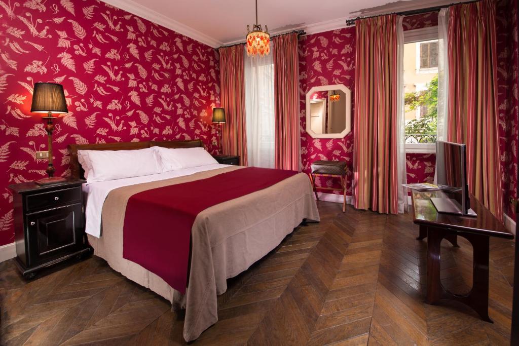 Postel nebo postele na pokoji v ubytování Boutique Hotel Anahi