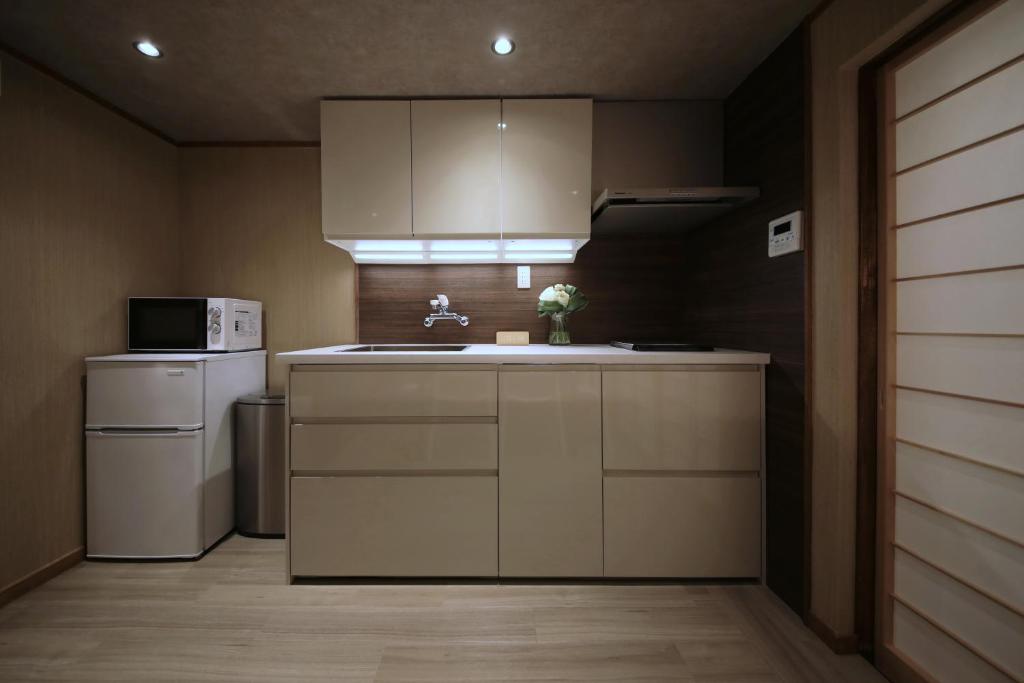 Kuchyň nebo kuchyňský kout v ubytování Shiki Homes IKKO 8