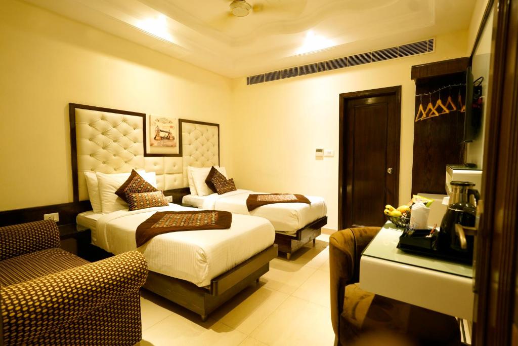 Cama o camas de una habitación en The Singh Empire,New Delhi