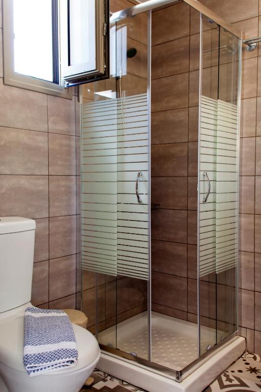 Koupelna v ubytování Mythos Suites Diskos