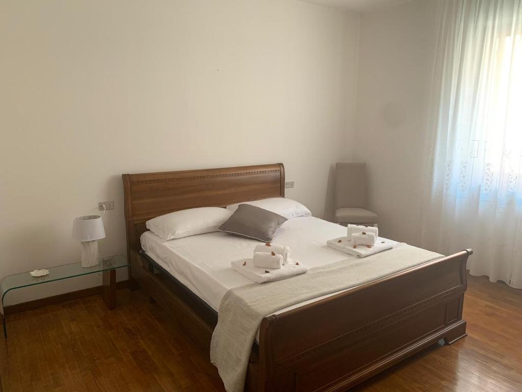 Łóżko lub łóżka w pokoju w obiekcie Il Portico 9