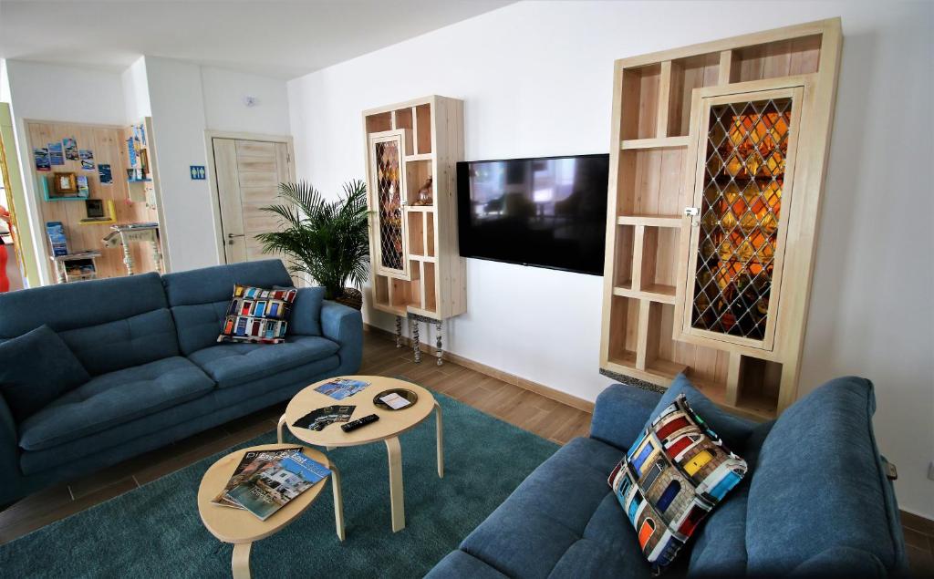 TV a/nebo společenská místnost v ubytování Authentic Tavira Hotel