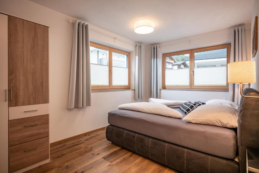 Postel nebo postele na pokoji v ubytování Apart Alpenrose