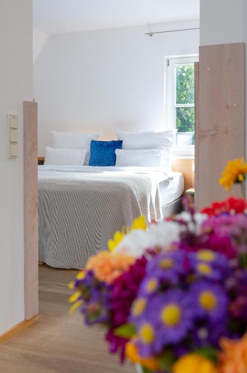 Postel nebo postele na pokoji v ubytování hezelhof hotel