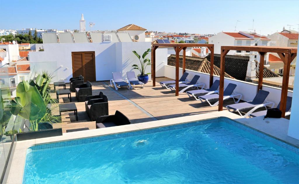 Bazén v ubytování Authentic Tavira Hotel nebo v jeho okolí