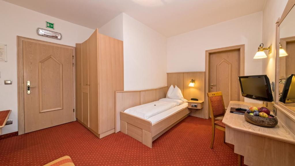 Letto o letti in una camera di Hotel Millanderhof