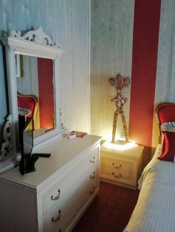 A bed or beds in a room at B&B Art