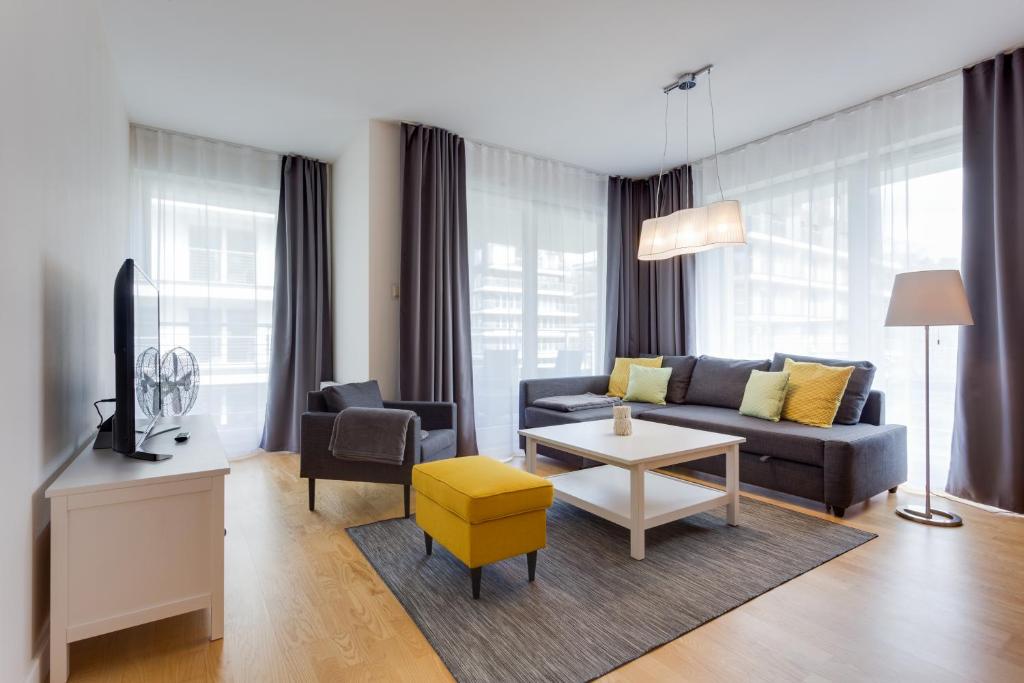 TV a/nebo společenská místnost v ubytování Apartamenty Tulipan - visitopl