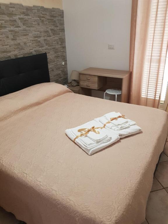 Postel nebo postele na pokoji v ubytování B&B Dimora del centro