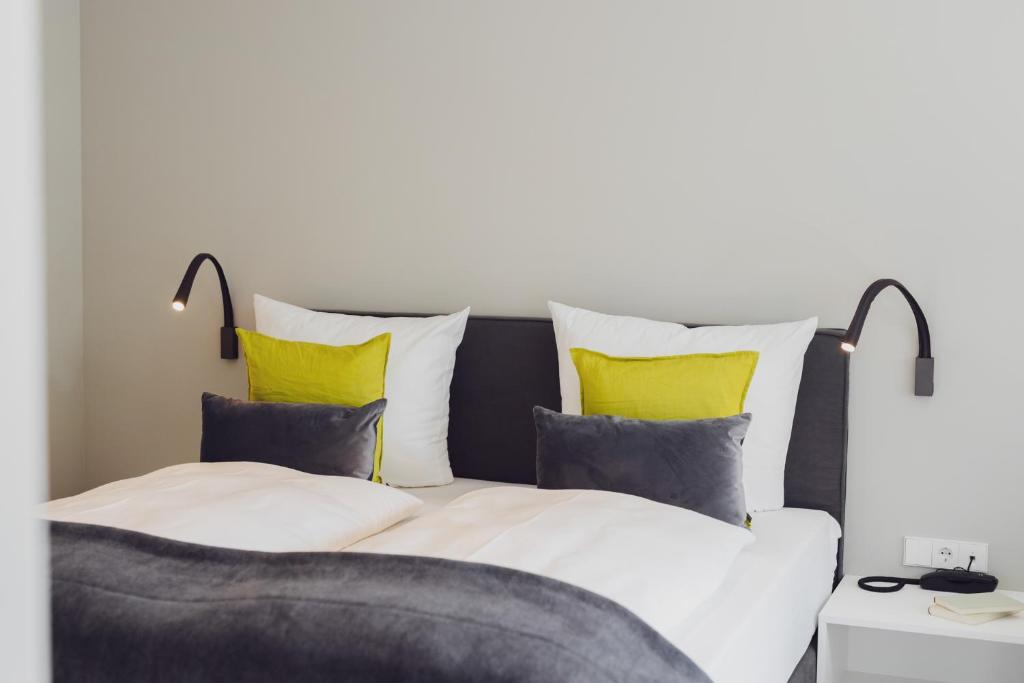 Postel nebo postele na pokoji v ubytování Hotel Caraleon
