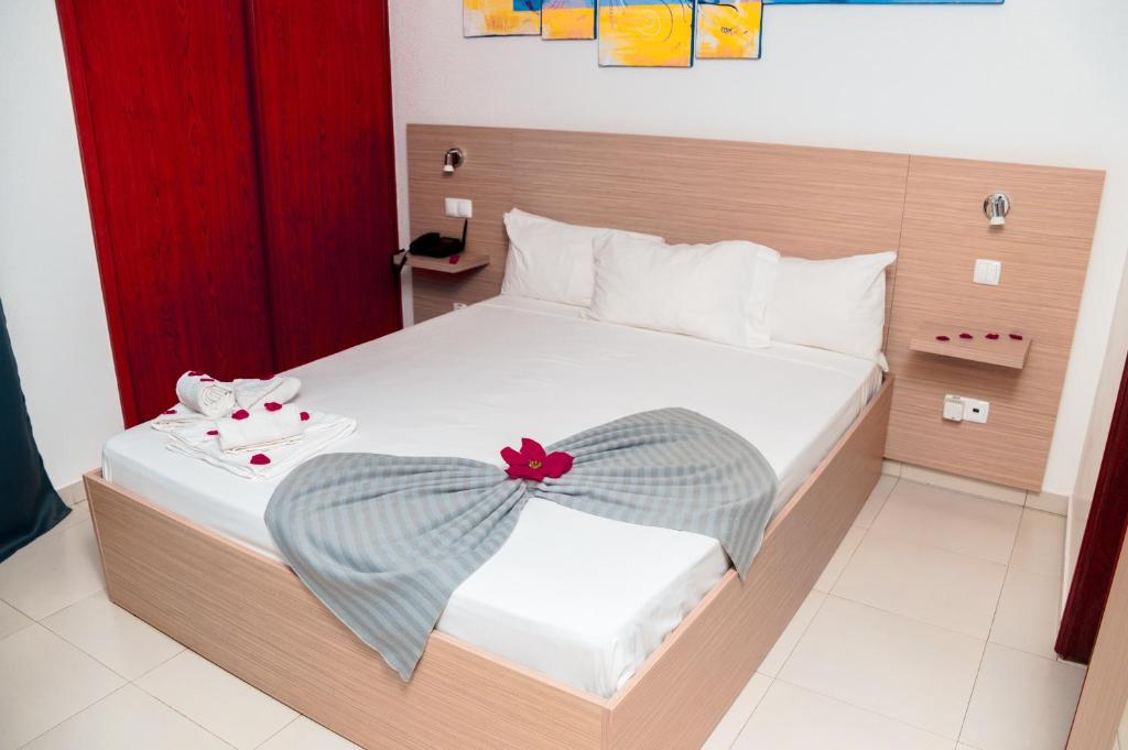 Postel nebo postele na pokoji v ubytování Hotel Cesaria