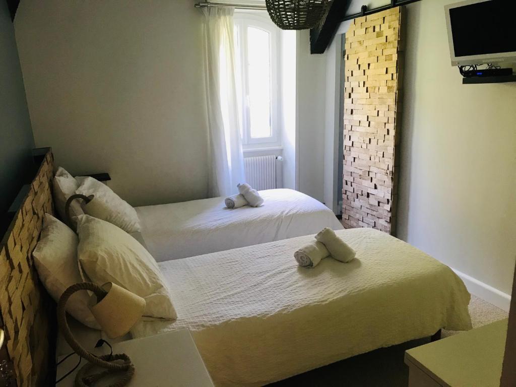 Postel nebo postele na pokoji v ubytování Le Tronçais