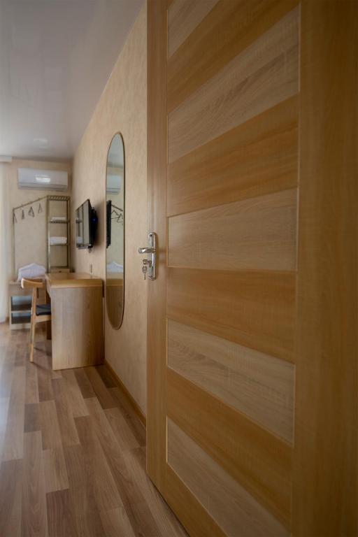 TV a/nebo společenská místnost v ubytování Ornament Boutique Hotel
