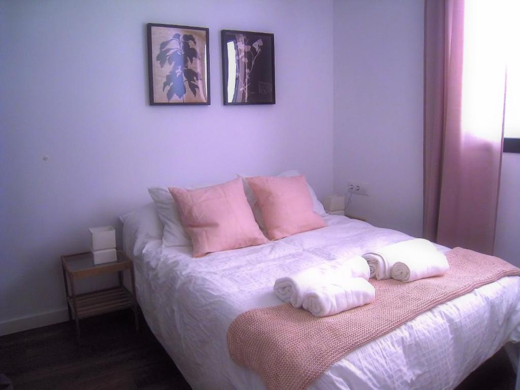 Postel nebo postele na pokoji v ubytování Vivienda Rural Olivar del Chanza