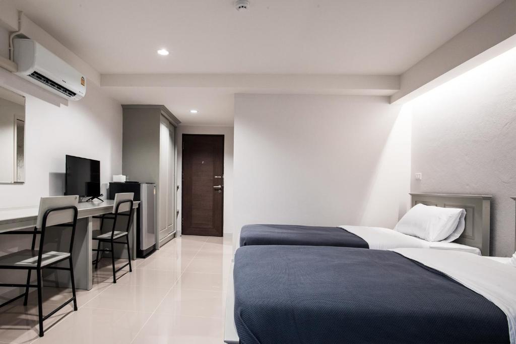 TV a/nebo společenská místnost v ubytování Tonkla Boutique Hotel