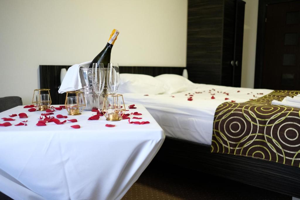 Postel nebo postele na pokoji v ubytování Hotel Sulbin