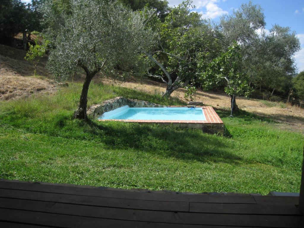 Bazén v ubytování Vivienda Rural Olivar del Chanza nebo v jeho okolí
