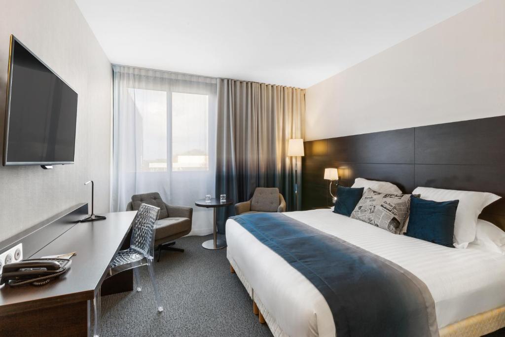 Postel nebo postele na pokoji v ubytování Best Western Plus Europe Hôtel Brest