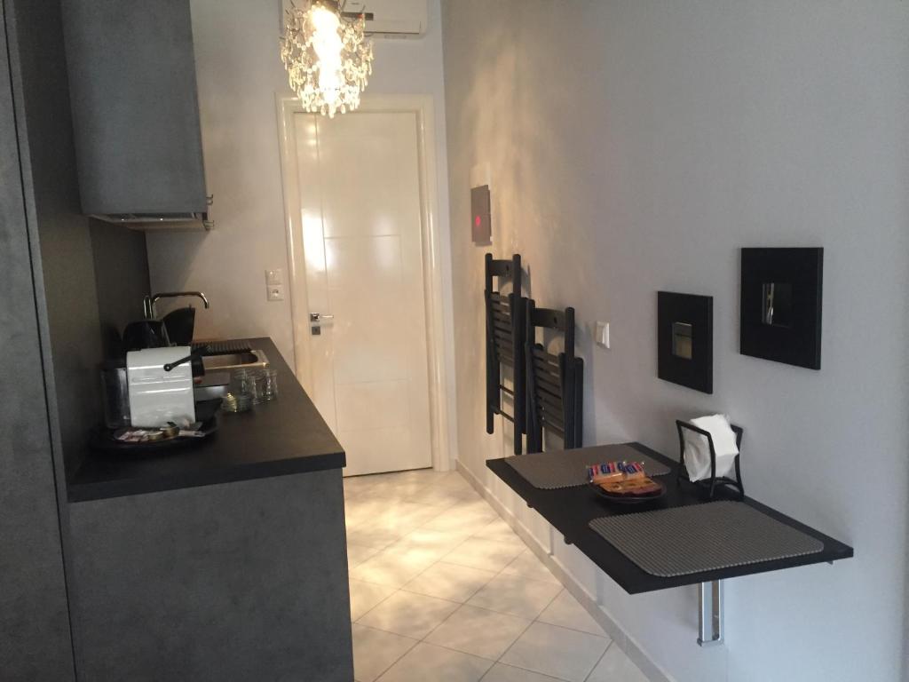 Kuchyňa alebo kuchynka v ubytovaní ALL SEASONS Luxury Suites1