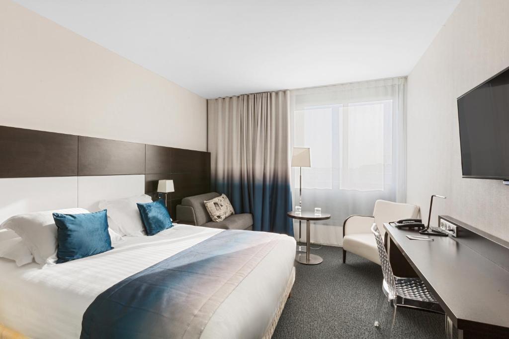 Postel nebo postele na pokoji v ubytování Best Western Plus Europe Hôtel Brest