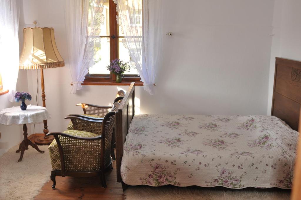 Postel nebo postele na pokoji v ubytování Villa Nostalgia