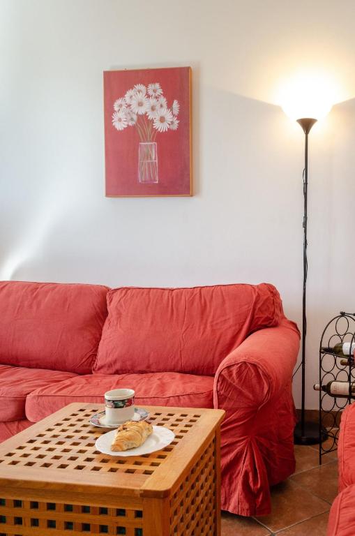 Гостиная зона в By the Sea Apartment Diana