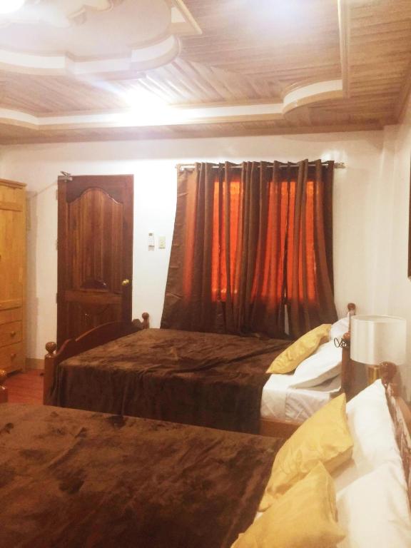 Postel nebo postele na pokoji v ubytování Villa Marii