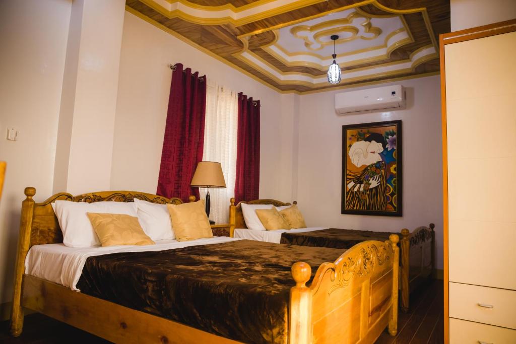 Postel nebo postele na pokoji v ubytování Villa Marii