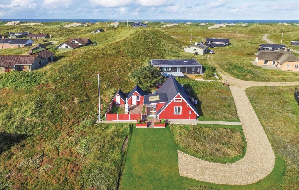 an aerial view of a house on a hill at Westside in Søndervig