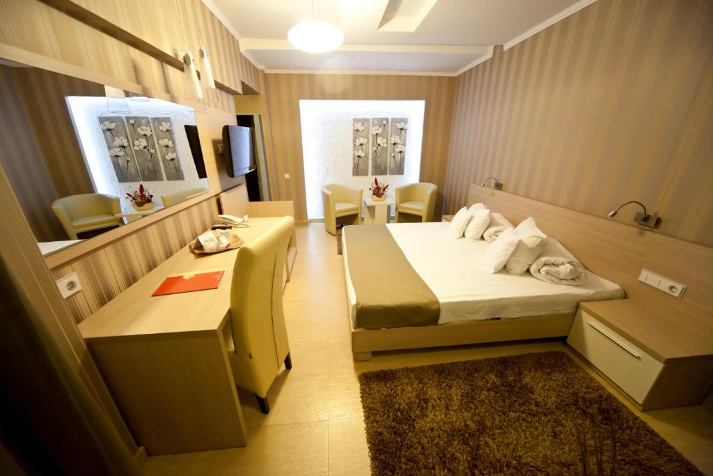 Postel nebo postele na pokoji v ubytování Hotel Confort