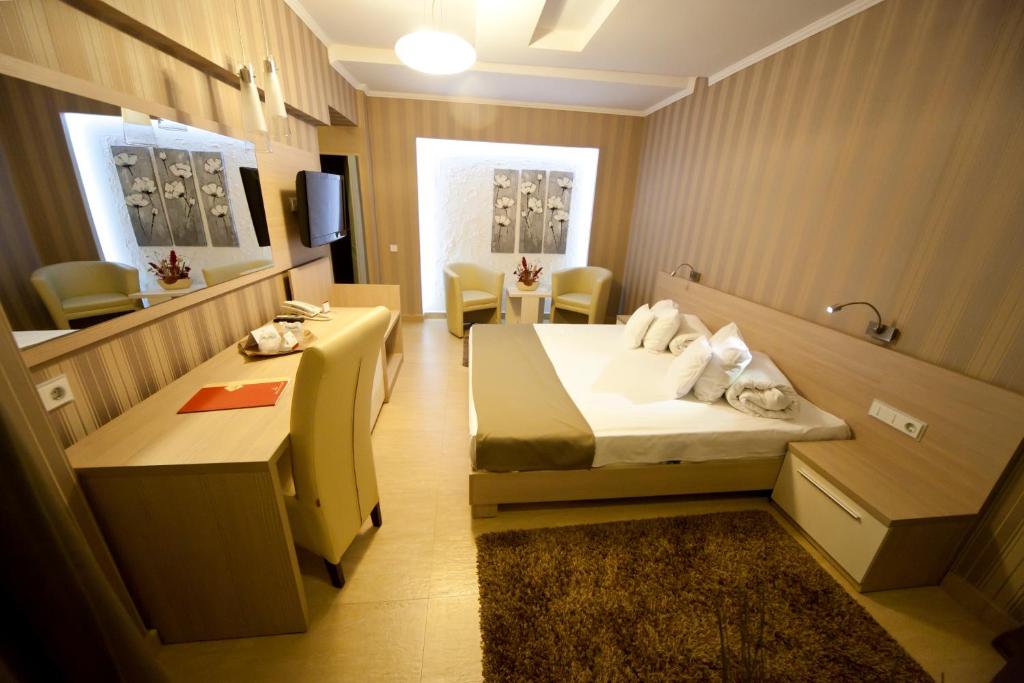 Postel nebo postele na pokoji v ubytování Hotel Confort