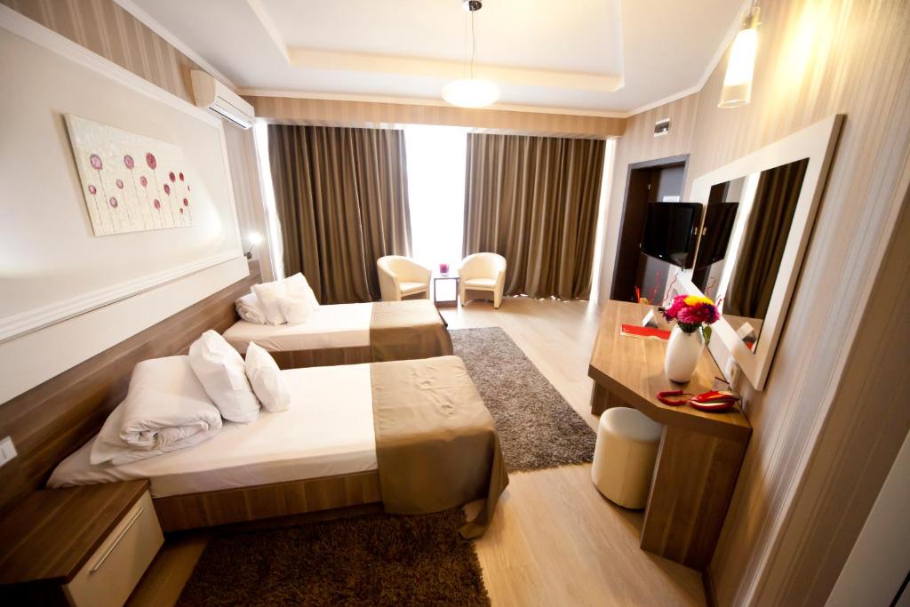 TV a/nebo společenská místnost v ubytování Hotel Confort