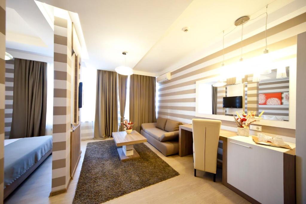 TV a/nebo společenská místnost v ubytování Hotel Confort