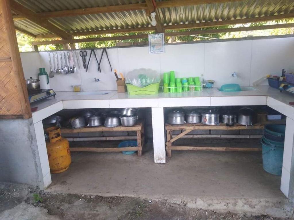 Kuchyň nebo kuchyňský kout v ubytování SeaLovers' Place Masasa Beach