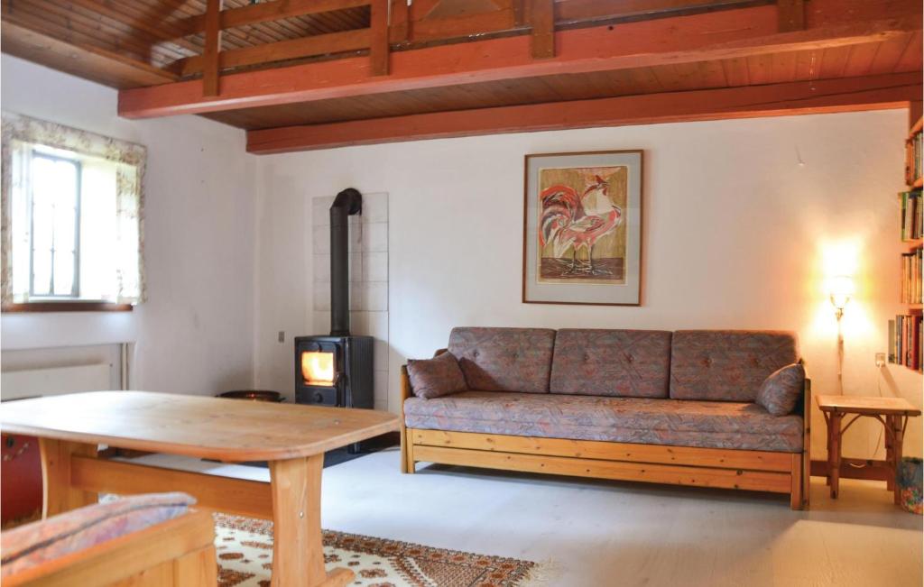 Posezení v ubytování Three-Bedroom Holiday Home In Kirke Eskilstrup